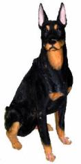 Dobermann Figur sitzend